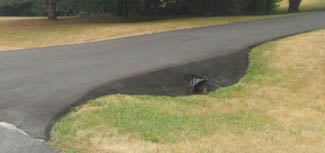 asphalt paving over culvert