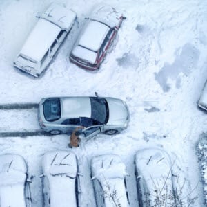 snowy icey driveway parking lot