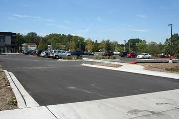 paving asphalt over concrete