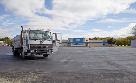 WOLF_blog_municipal-05-wolf-paving-truck-parking-lot.jpg